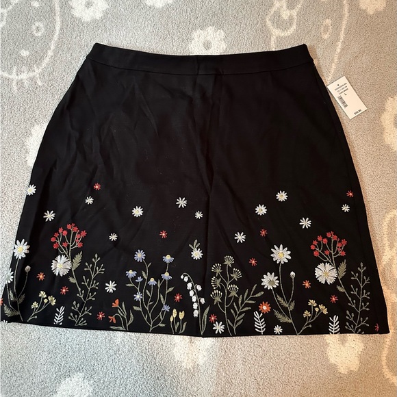 Ricki's Dresses & Skirts - Women’s Ricki’s black flower patterned mini stretchy skirt size large